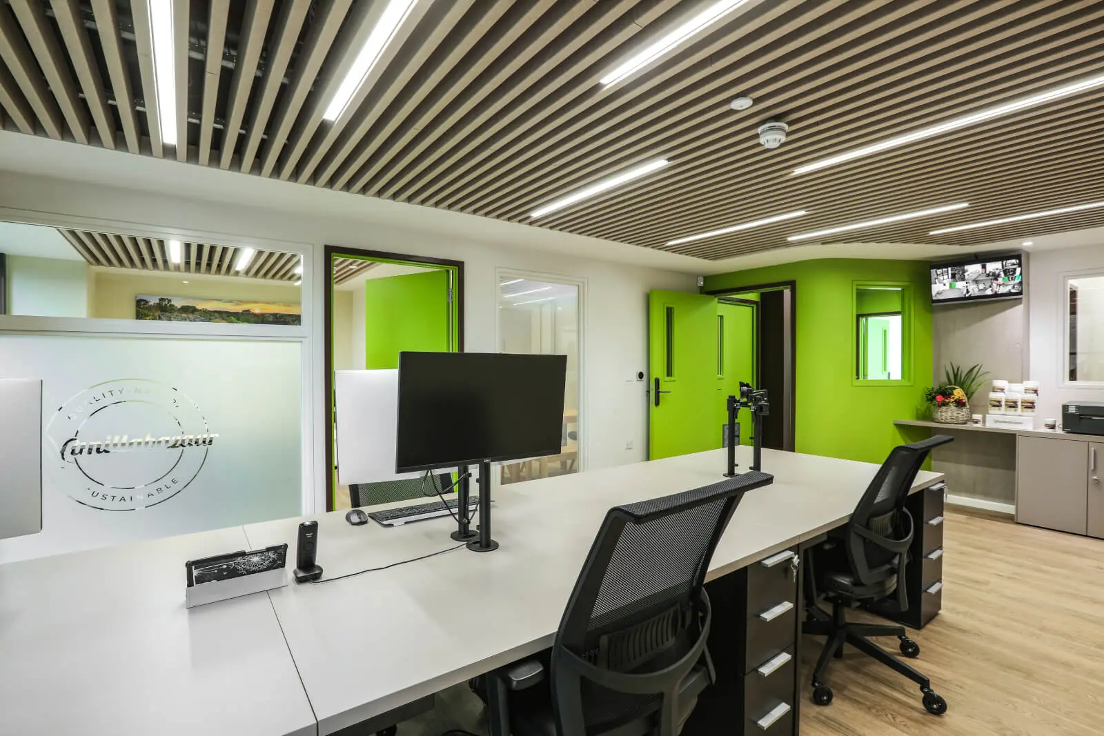 Vanilla Bazaar office space with designer furniture, laminated wood flooring, ceiling and glass partitions 21