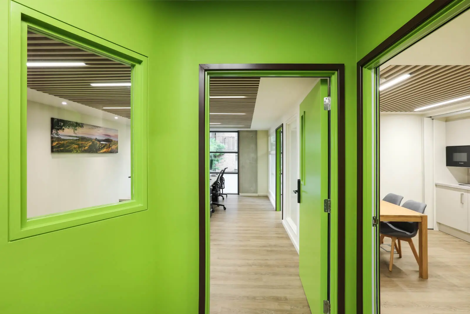 Vanilla Bazaar office space with designer furniture, laminated wood flooring, ceiling and glass partitions 25