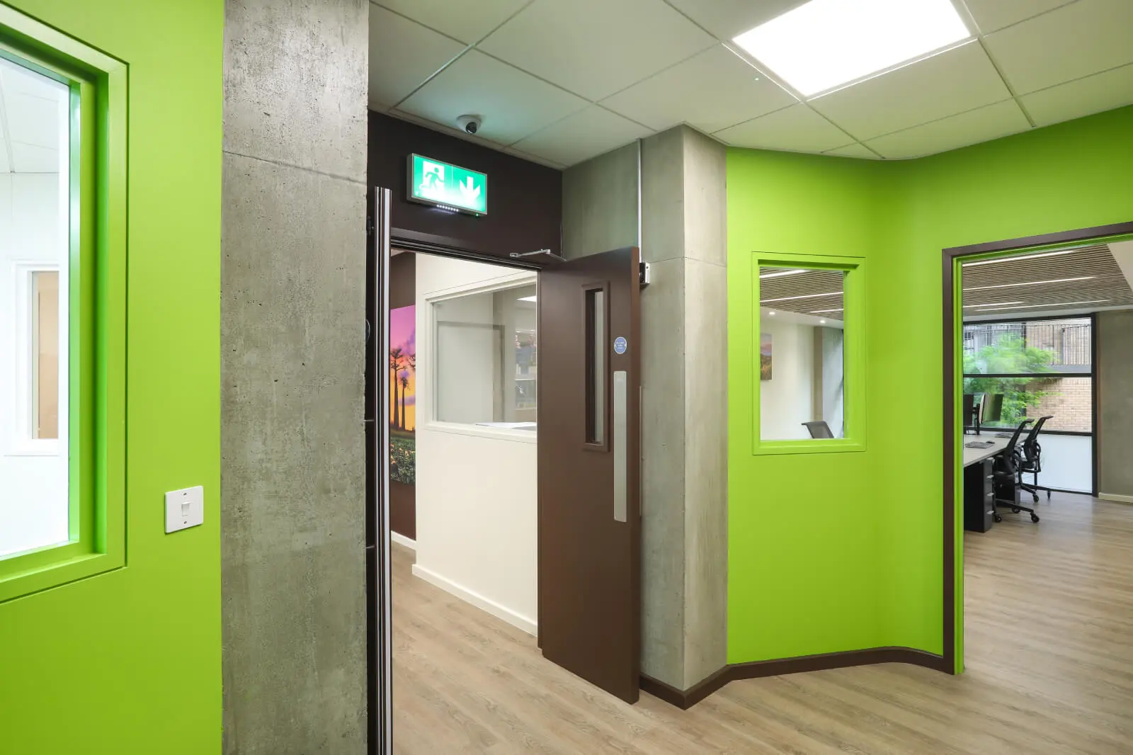 Vanilla Bazaar office space with designer furniture, laminated wood flooring, ceiling and glass partitions 26