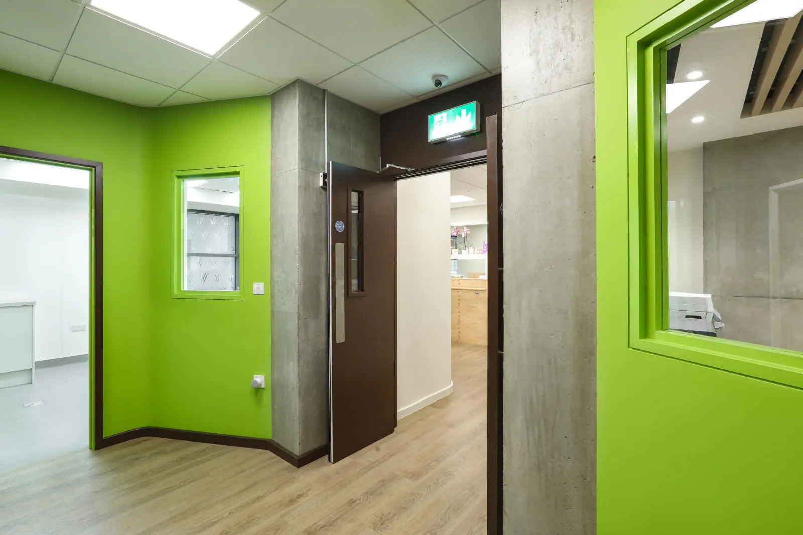 Vanilla Bazaar office space with designer furniture, laminated wood flooring, ceiling and glass partitions 27