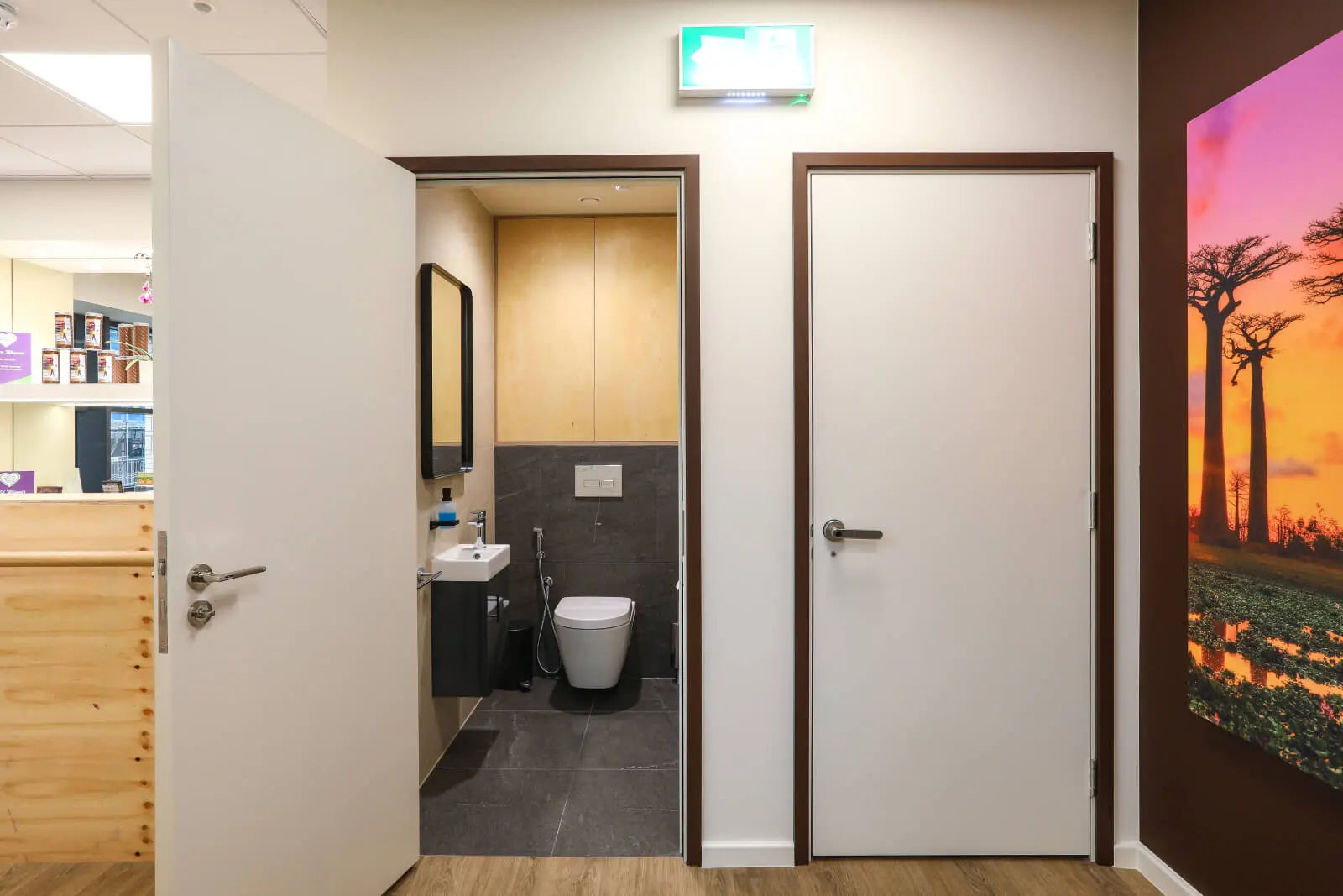 Vanilla Bazaar office space with designer furniture, laminated wood flooring, ceiling and glass partitions 29
