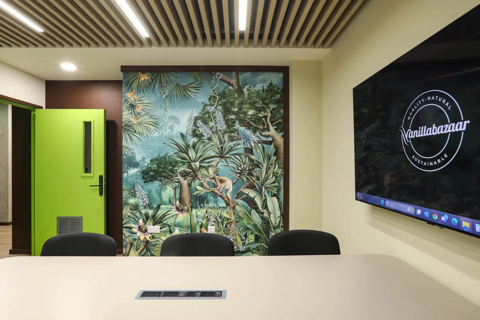 Vanilla Bazaar office space with designer furniture, laminated wood flooring, ceiling and glass partitions 31