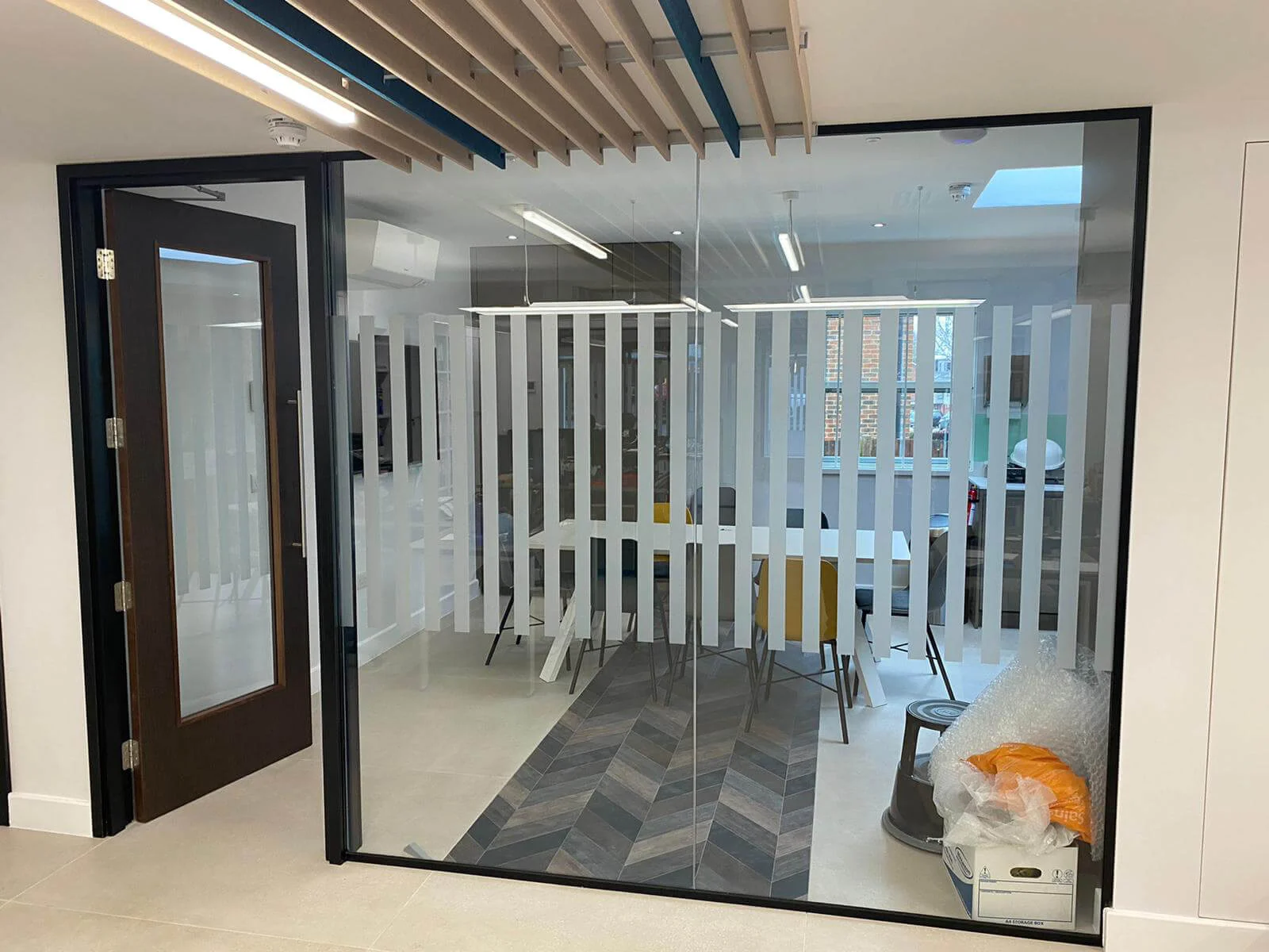 Deekay Group office space with deisgner furniture, walls and glass partitions 11