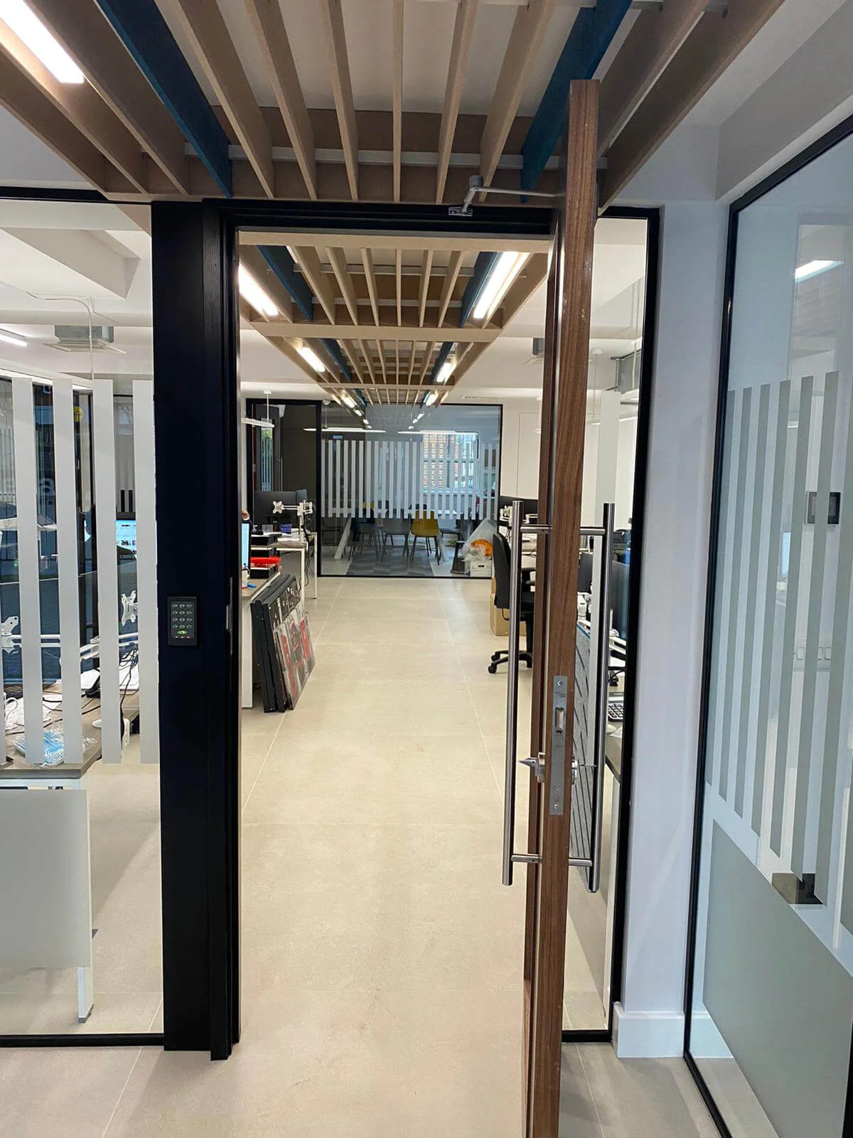 Deekay Group office space with deisgner furniture, walls and glass partitions 12