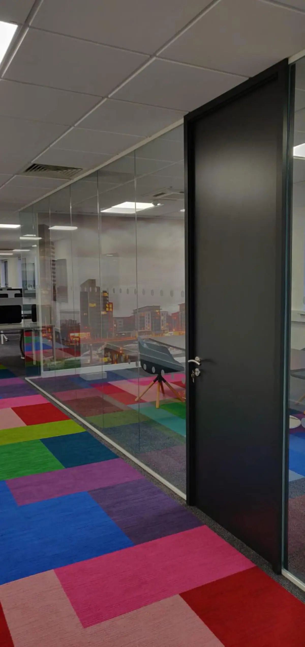 Ngage Recruitment office space with designer furniture and glass partitions and carpet tile flooring along with suspended grid ceiling 10