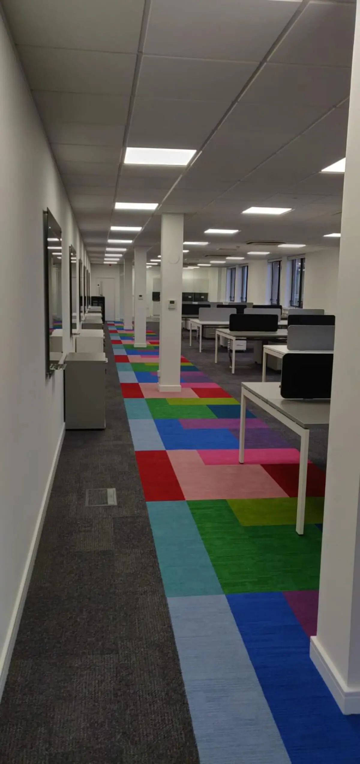 Ngage Recruitment office space with designer furniture and glass partitions and carpet tile flooring along with suspended grid ceiling 11