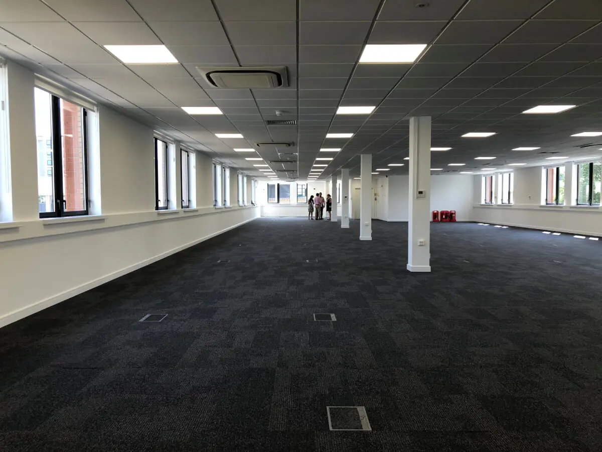 Ngage Recruitment office space with designer furniture and glass partitions and carpet tile flooring along with suspended grid ceiling 12
