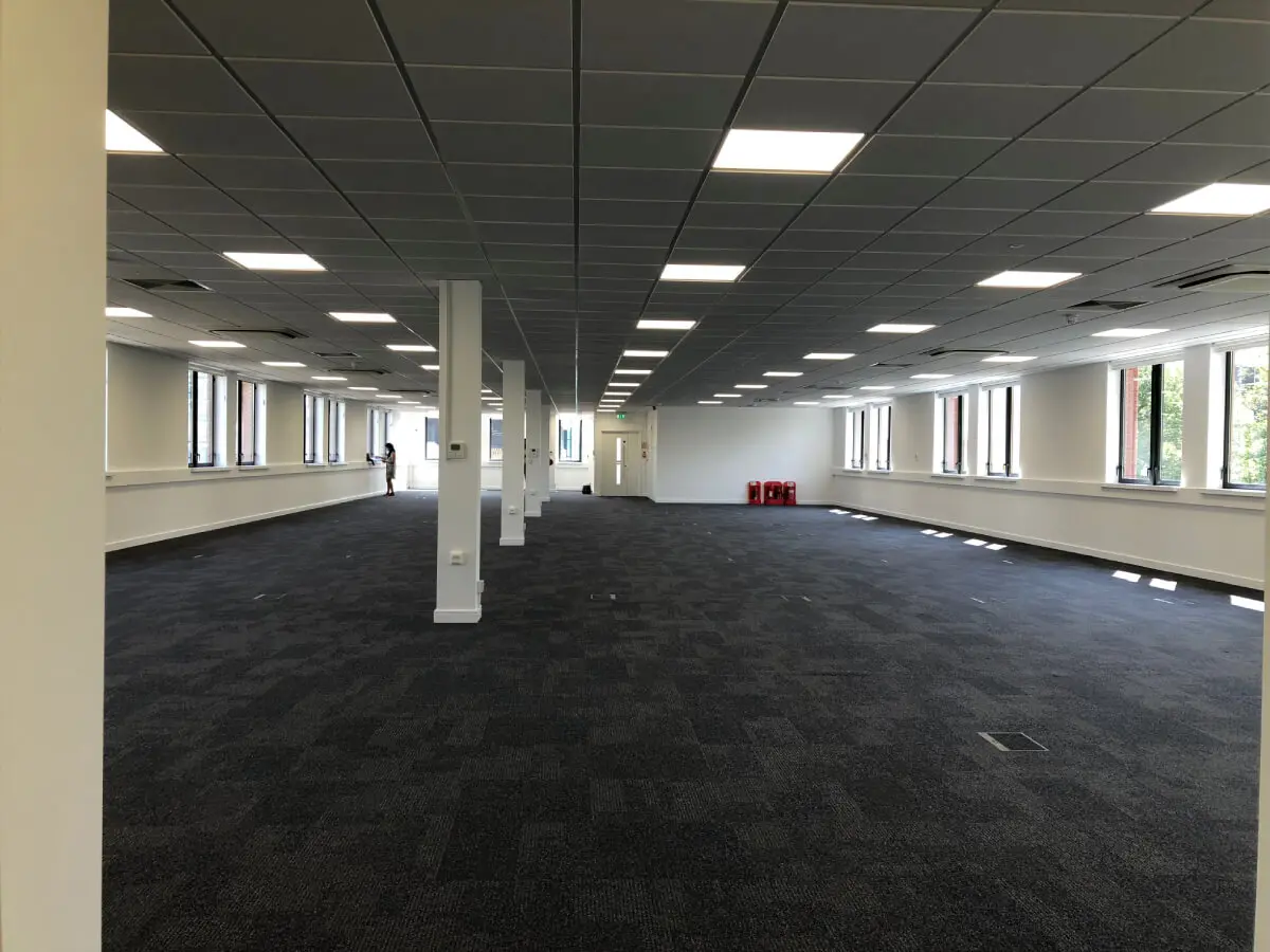 Ngage Recruitment office space with designer furniture and glass partitions and carpet tile flooring along with suspended grid ceiling 13