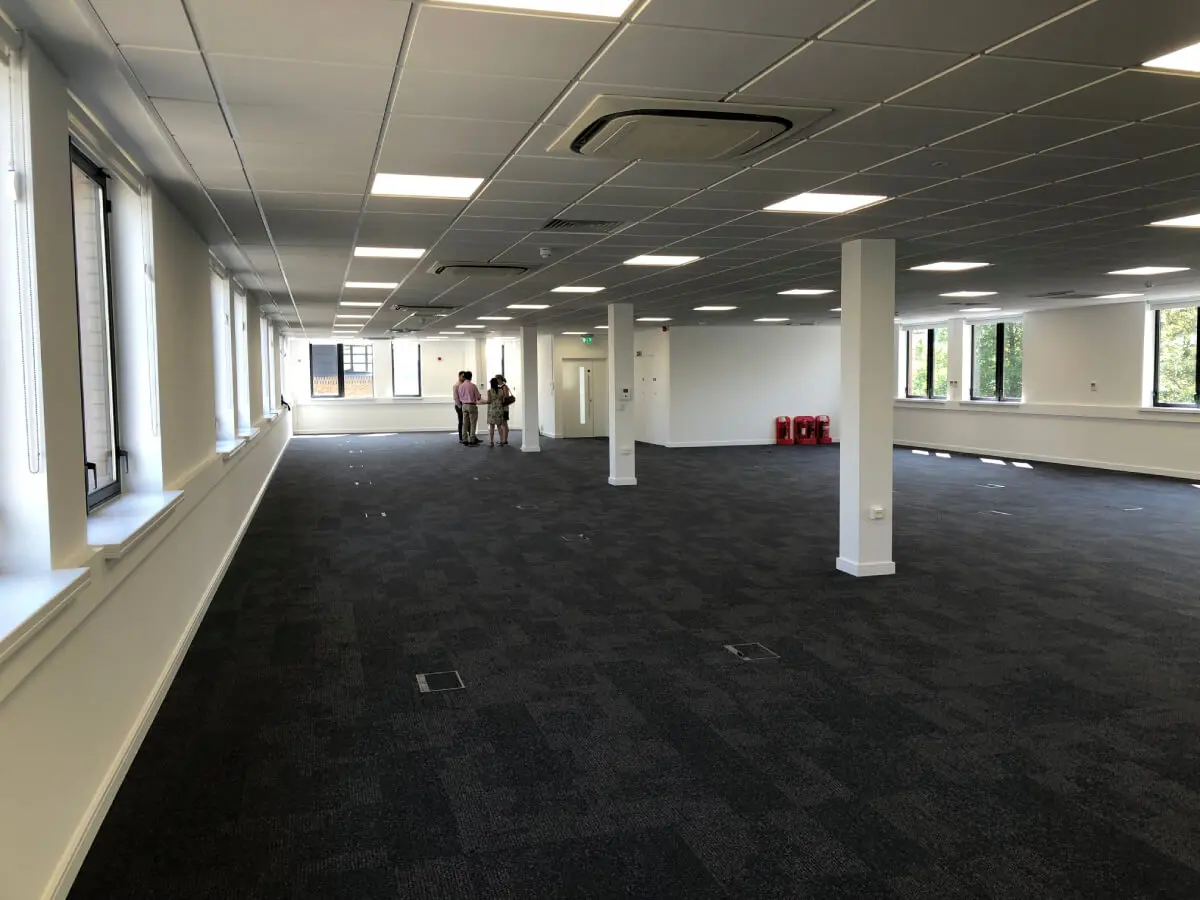 Ngage Recruitment office space with designer furniture and glass partitions and carpet tile flooring along with suspended grid ceiling 15
