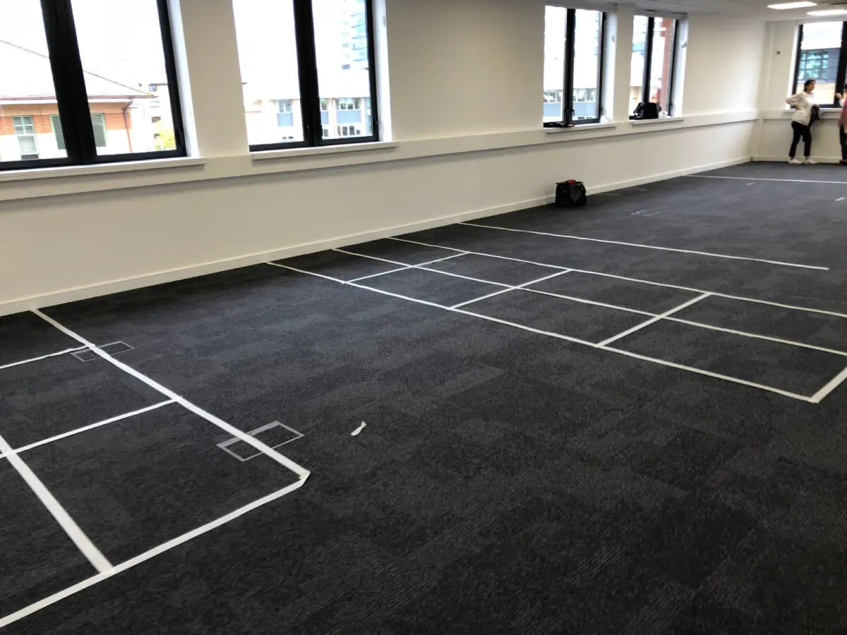 Ngage Recruitment office space with designer furniture and glass partitions and carpet tile flooring along with suspended grid ceiling 17
