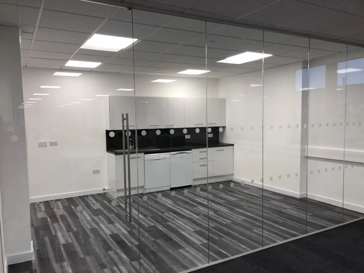 Ngage Recruitment office space with designer furniture and glass partitions and carpet tile flooring along with suspended grid ceiling 18