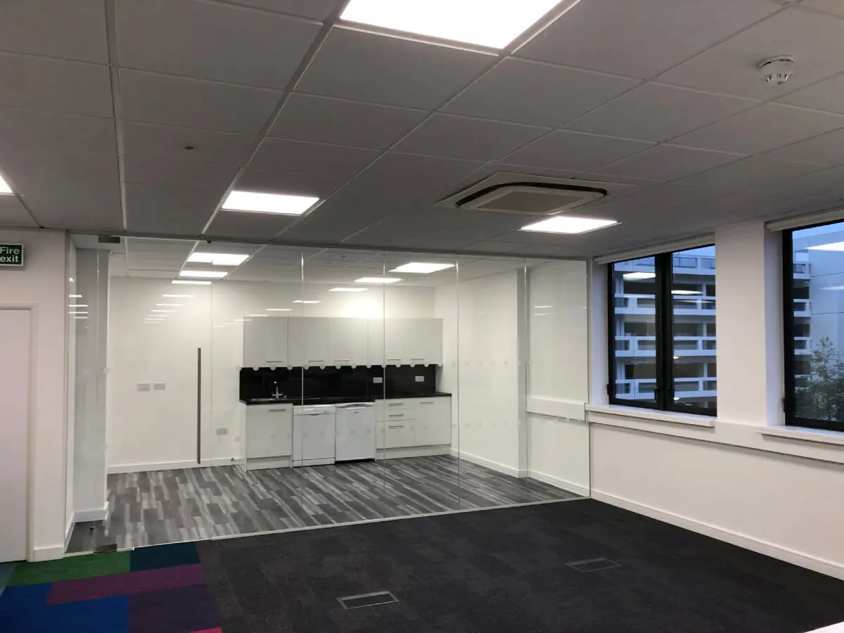 Ngage Recruitment office space with designer furniture and glass partitions and carpet tile flooring along with suspended grid ceiling 20