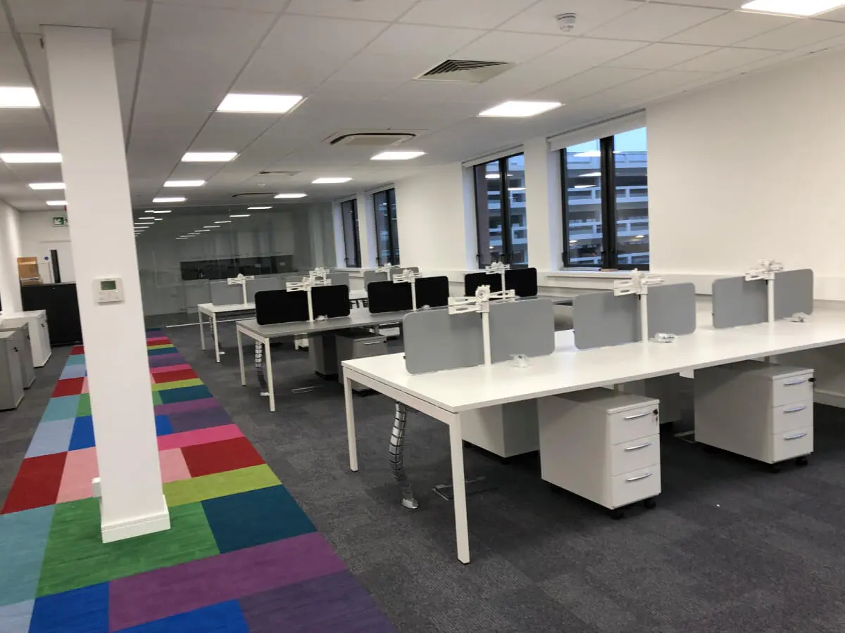 Ngage Recruitment office space with designer furniture and glass partitions and carpet tile flooring along with suspended grid ceiling 22
