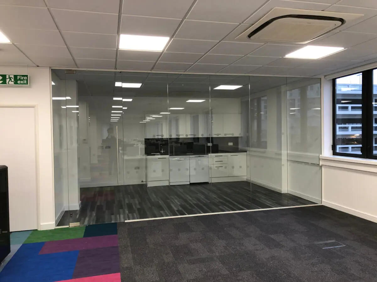 Ngage Recruitment office space with designer furniture and glass partitions and carpet tile flooring along with suspended grid ceiling 23