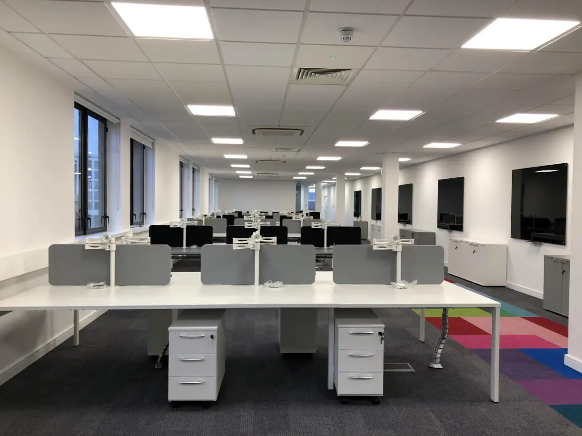 Ngage Recruitment office space with designer furniture and glass partitions and carpet tile flooring along with suspended grid ceiling 24