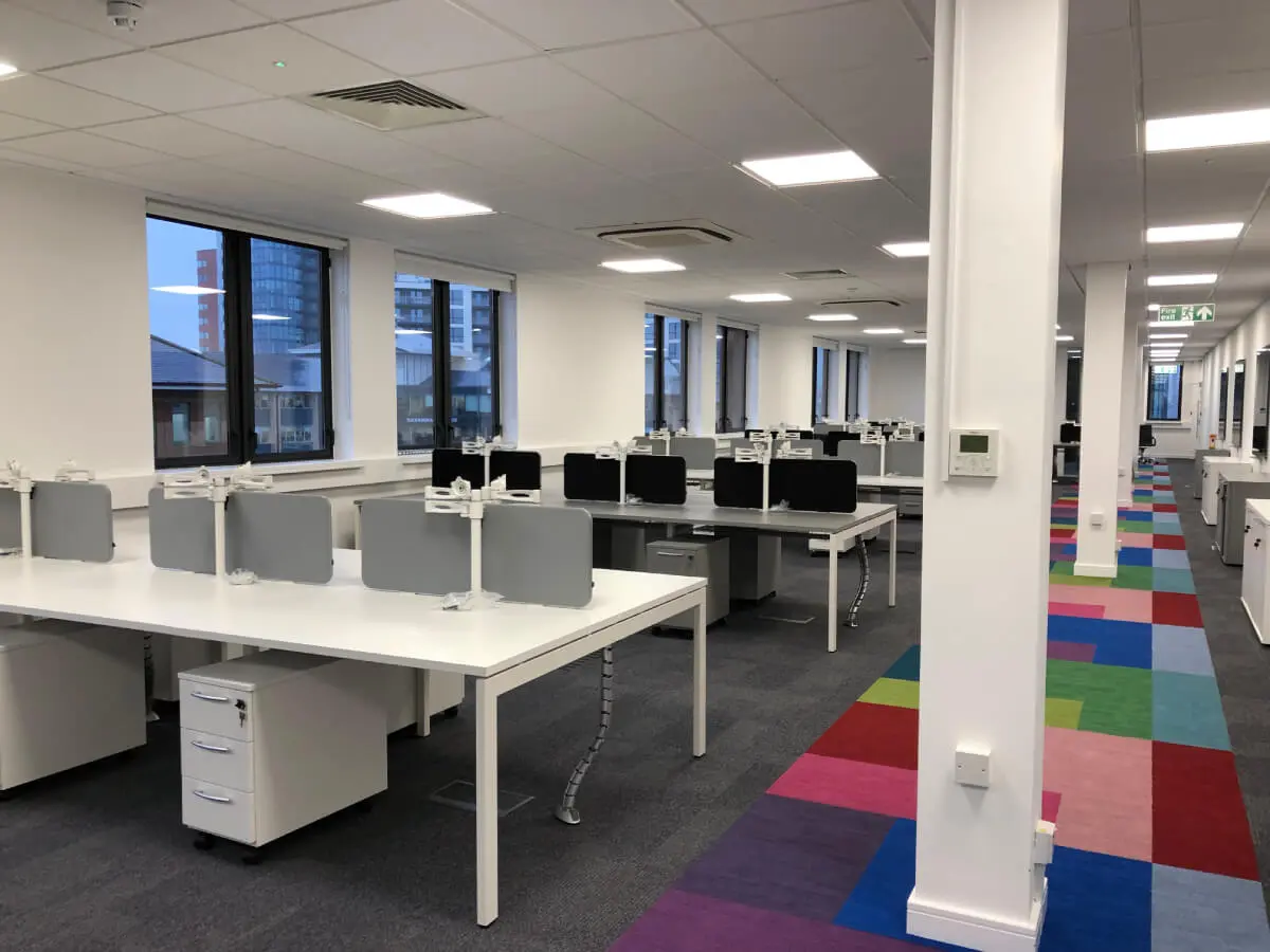 Ngage Recruitment office space with designer furniture and glass partitions and carpet tile flooring along with suspended grid ceiling 27