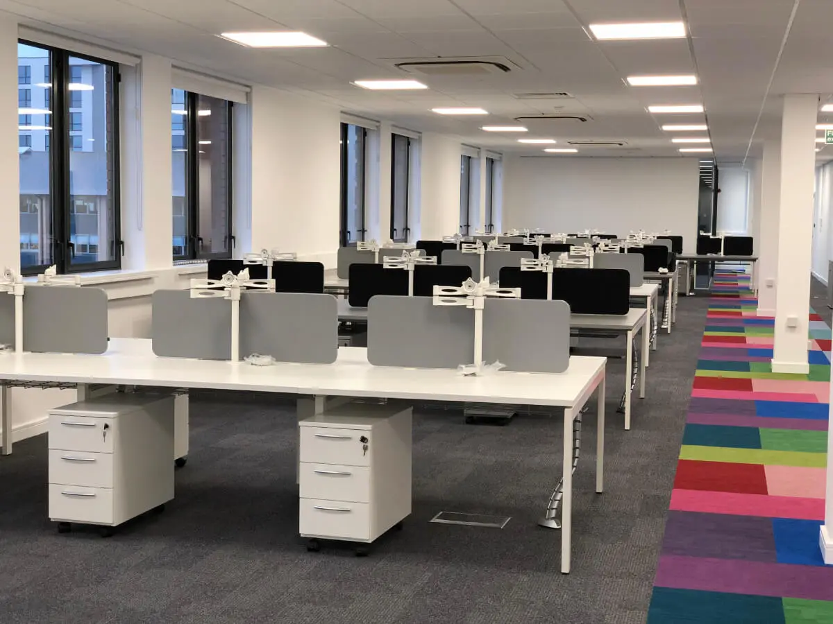 Ngage Recruitment office space with designer furniture and glass partitions and carpet tile flooring along with suspended grid ceiling 30