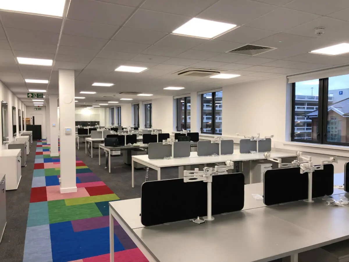 Ngage Recruitment office space with designer furniture and glass partitions and carpet tile flooring along with suspended grid ceiling 36