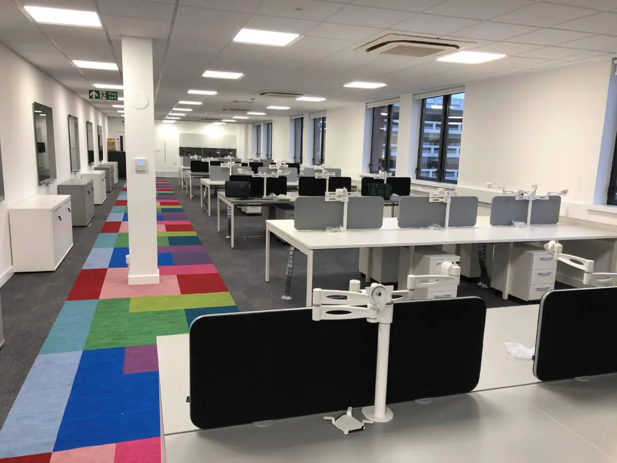 Ngage Recruitment office space with designer furniture and glass partitions and carpet tile flooring along with suspended grid ceiling 37