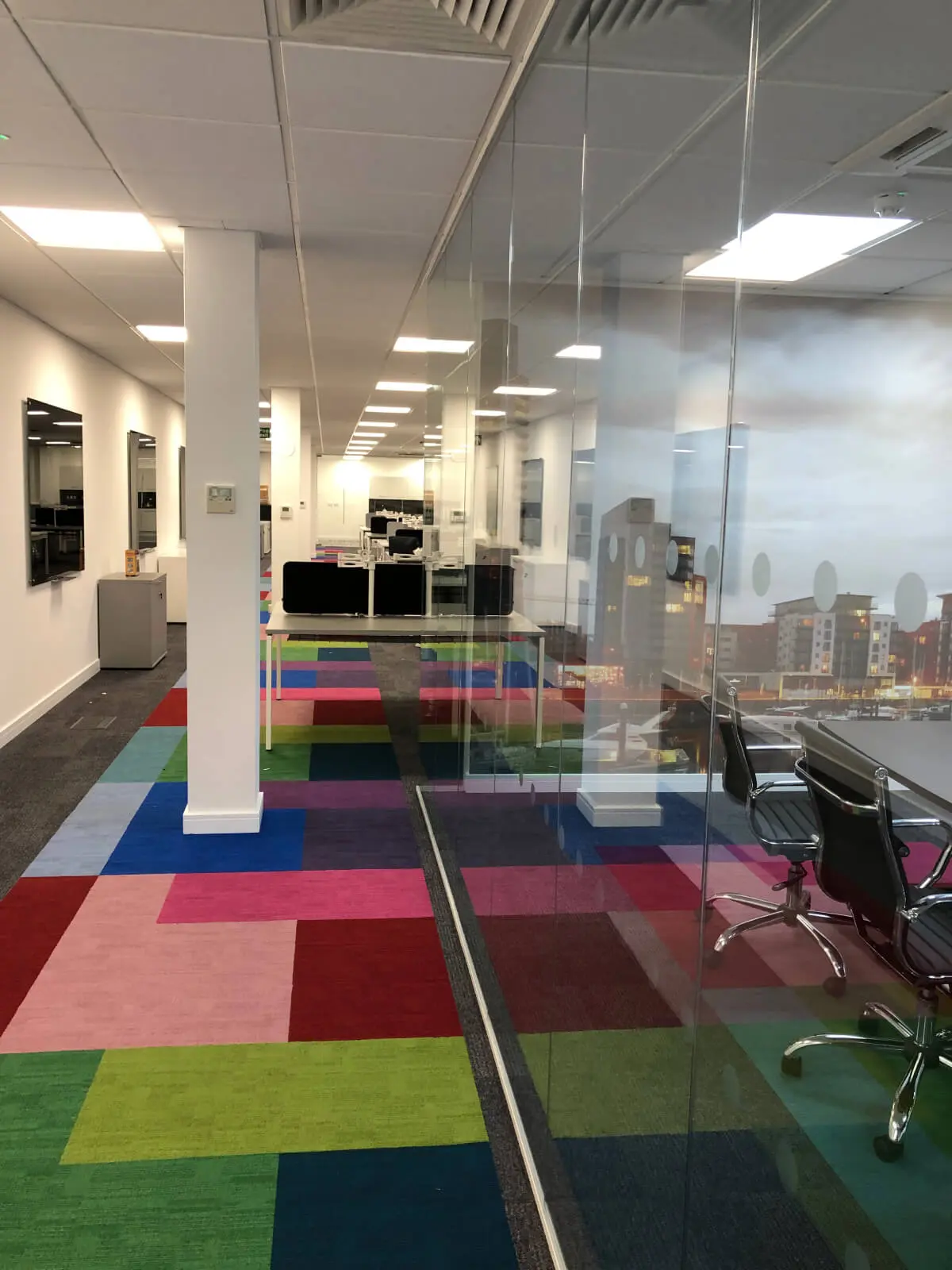 Ngage Recruitment office space with designer furniture and glass partitions and carpet tile flooring along with suspended grid ceiling 40