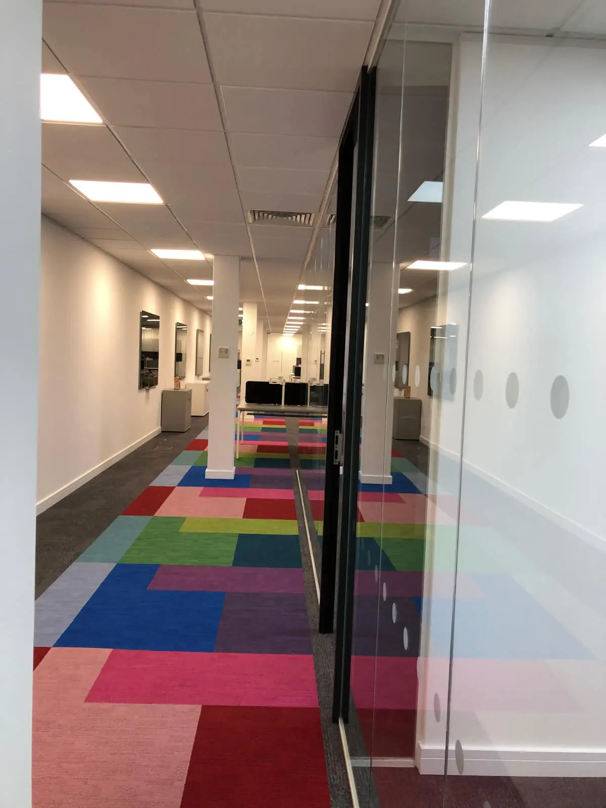 Ngage Recruitment office space with designer furniture and glass partitions and carpet tile flooring along with suspended grid ceiling 41