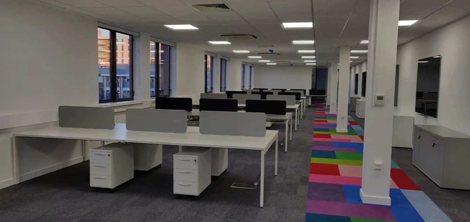 Ngage Recruitment office space with designer furniture and glass partitions and carpet tile flooring along with suspended grid ceiling 43