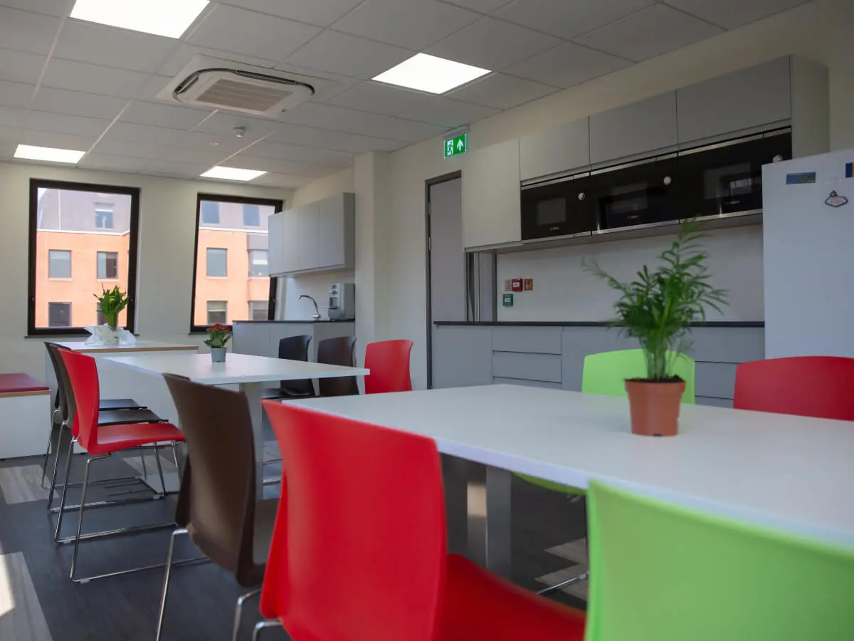 Refurbished office with tables and chairs