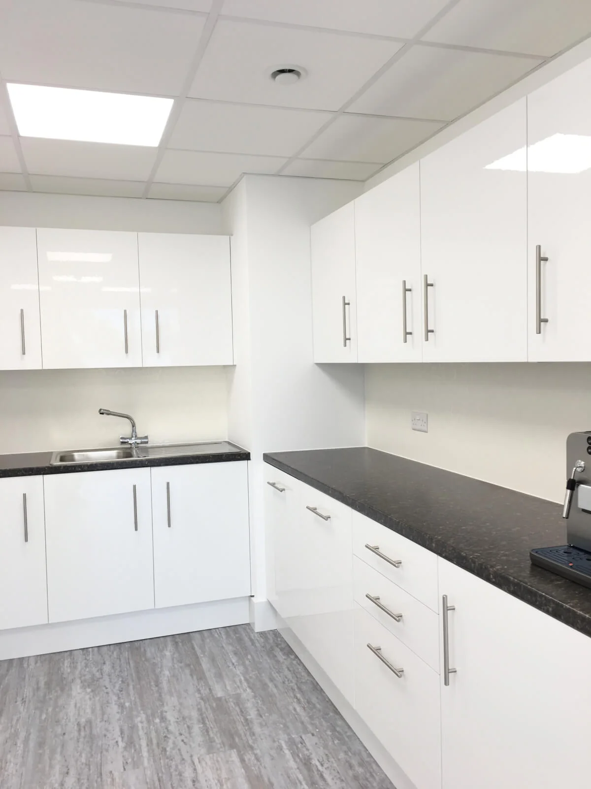 White and black splash backs in office space